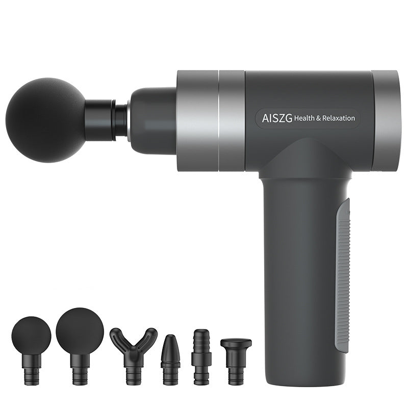 Grey massage gun with attachments for muscle recovery and maintenance. Massager 