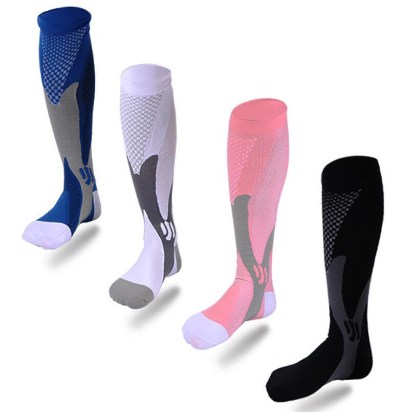 Compression socks of various colors to improve performance and aid in muscle recovery. Athletic socks 