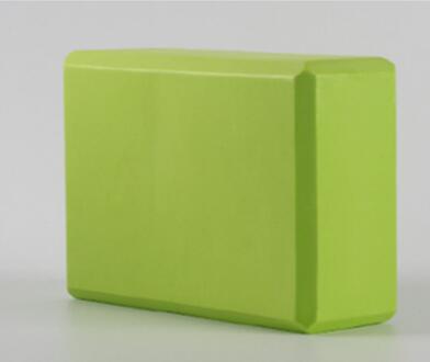 Green Yoga block made of high density, non-toxic EVA Foam.