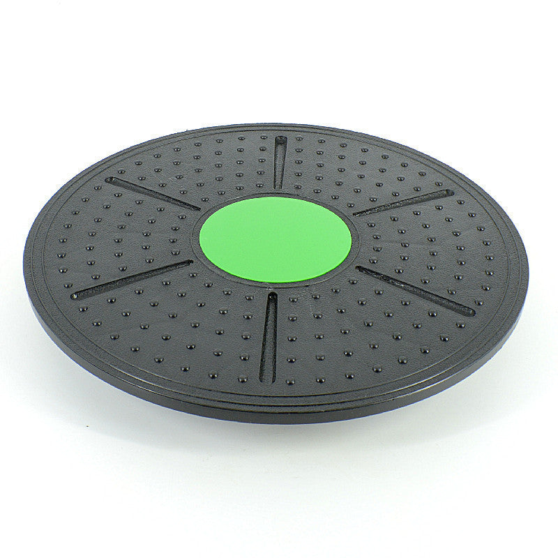 Sturdy balance board with green center. Balance trainer 