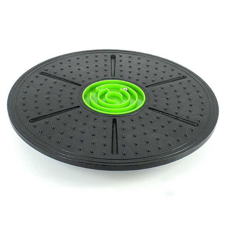 Sturdy balance board with green center. Balance trainer 