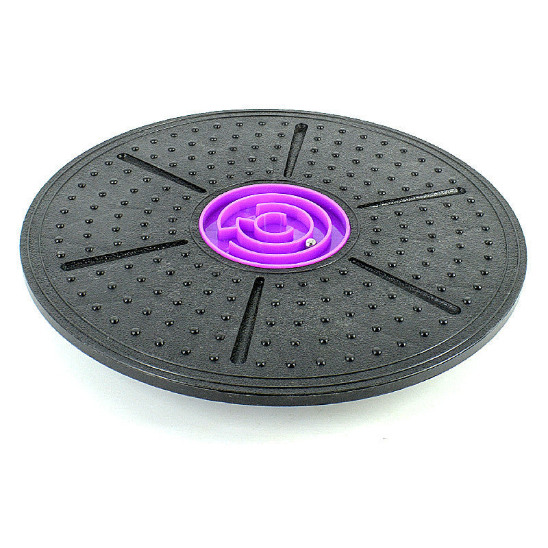 Sturdy balance board with purple center. Balance trainer 