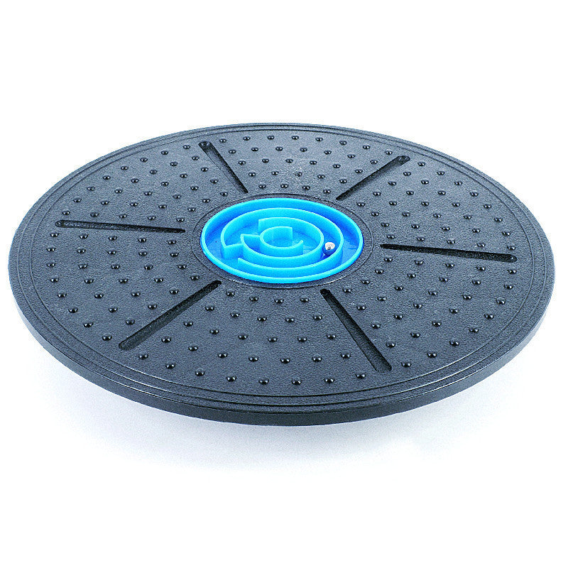 Sturdy balance board with blue center. Balance trainer 