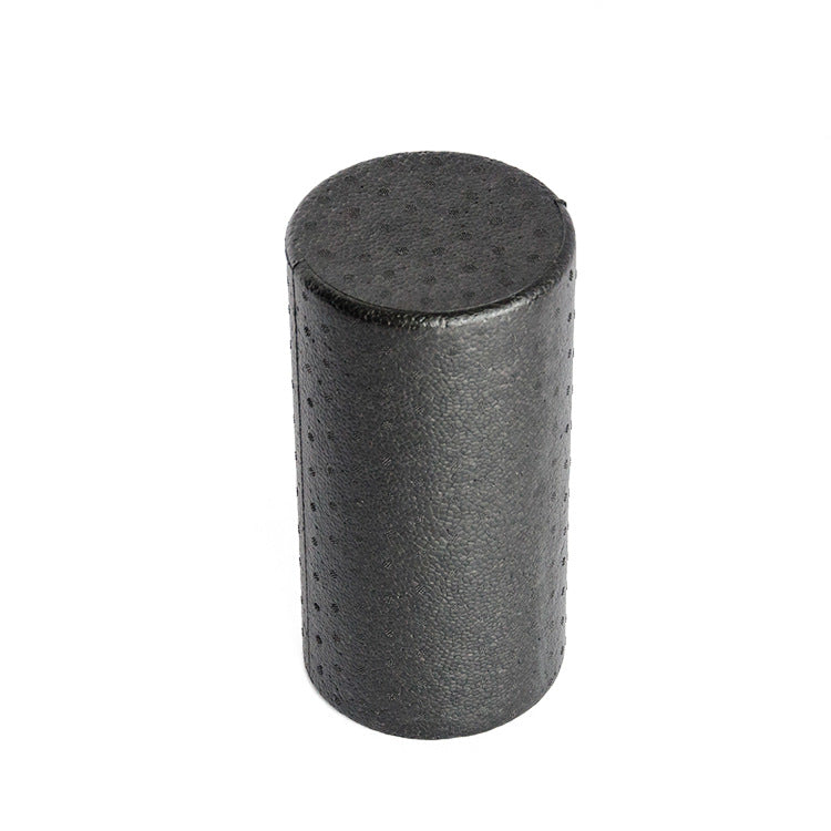 Black foam roller for muscle recovery and maintenance.