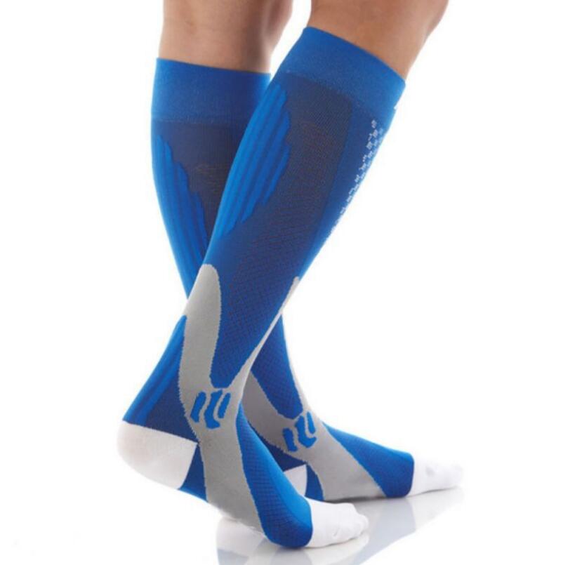 Blue Compression socks to improve performance and aid in muscle recovery. Athletic socks 