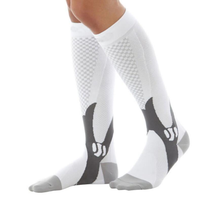 White Compression socks to improve performance and aid in muscle recovery. Athletic socks 