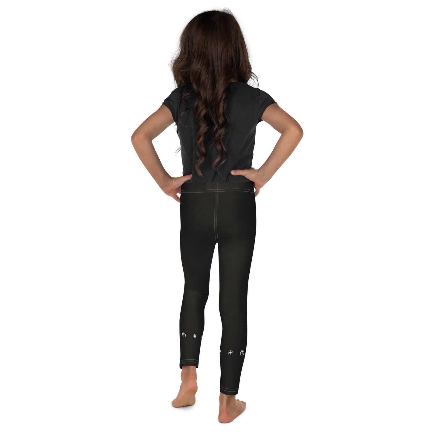 Black soft microfiber kids leggings with an elastic waistband by An Athlete Trains