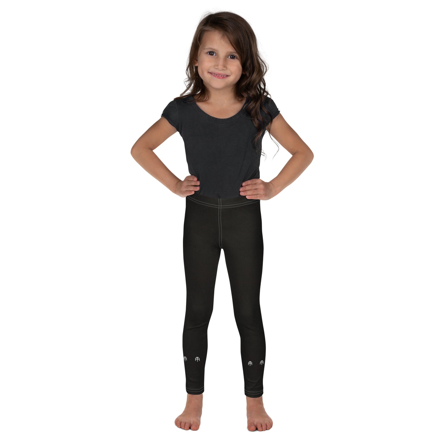 Black soft microfiber kids leggings with an elastic waistband by An Athlete Trains