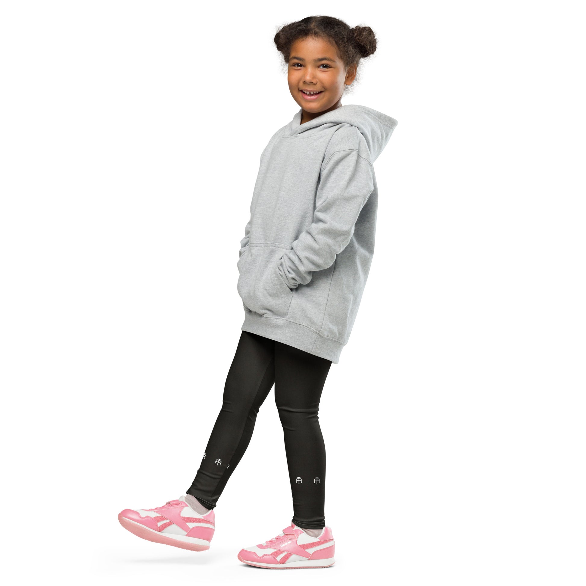 Black soft microfiber kids leggings with an elastic waistband by An Athlete Trains