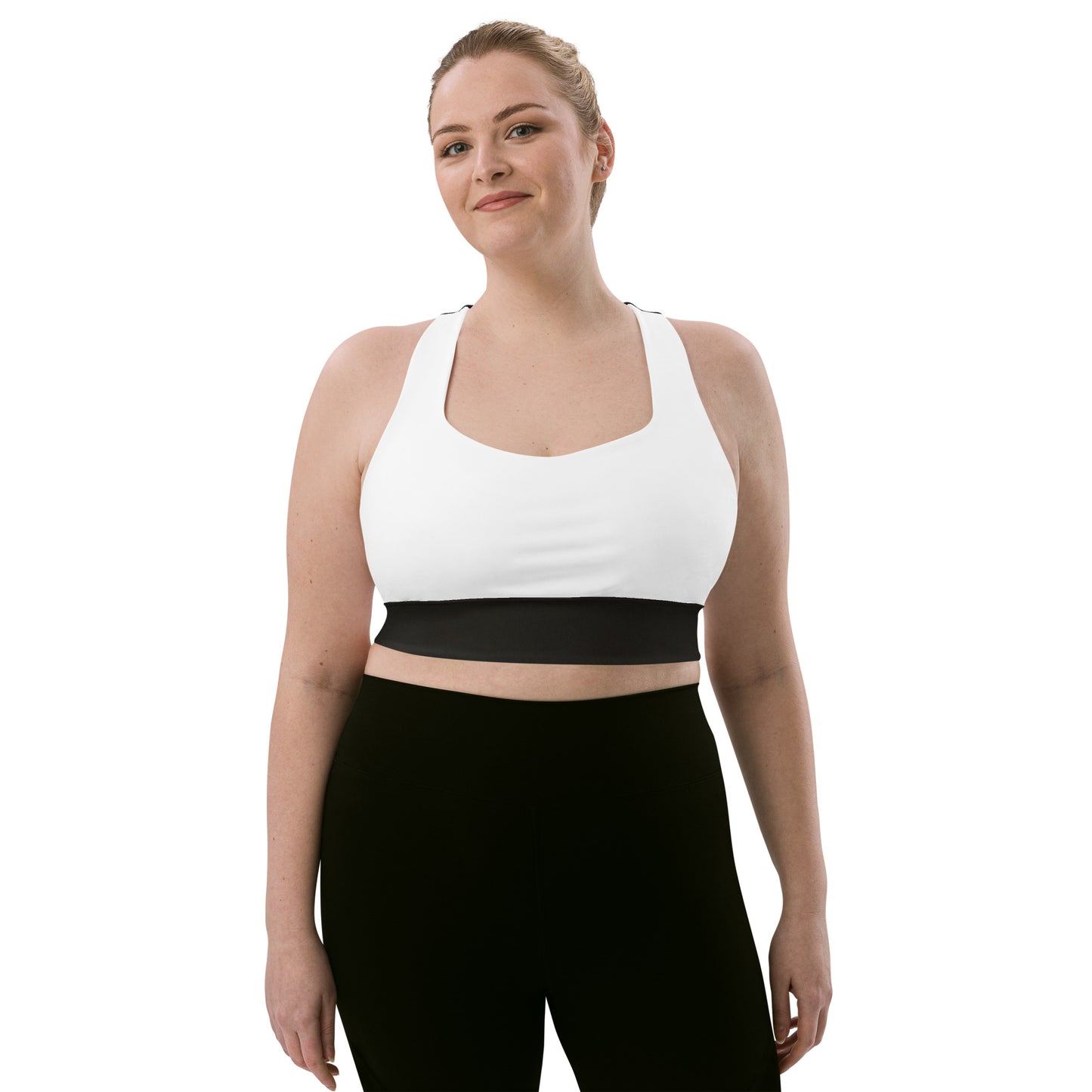 White and black sports bra performance activewear. Compression fabric with sports mesh lining.