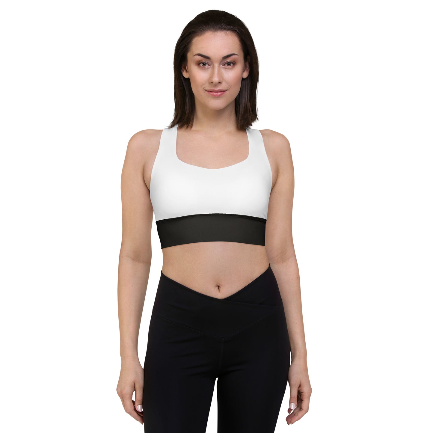 White and black sports bra performance activewear. Compression fabric with sports mesh lining.