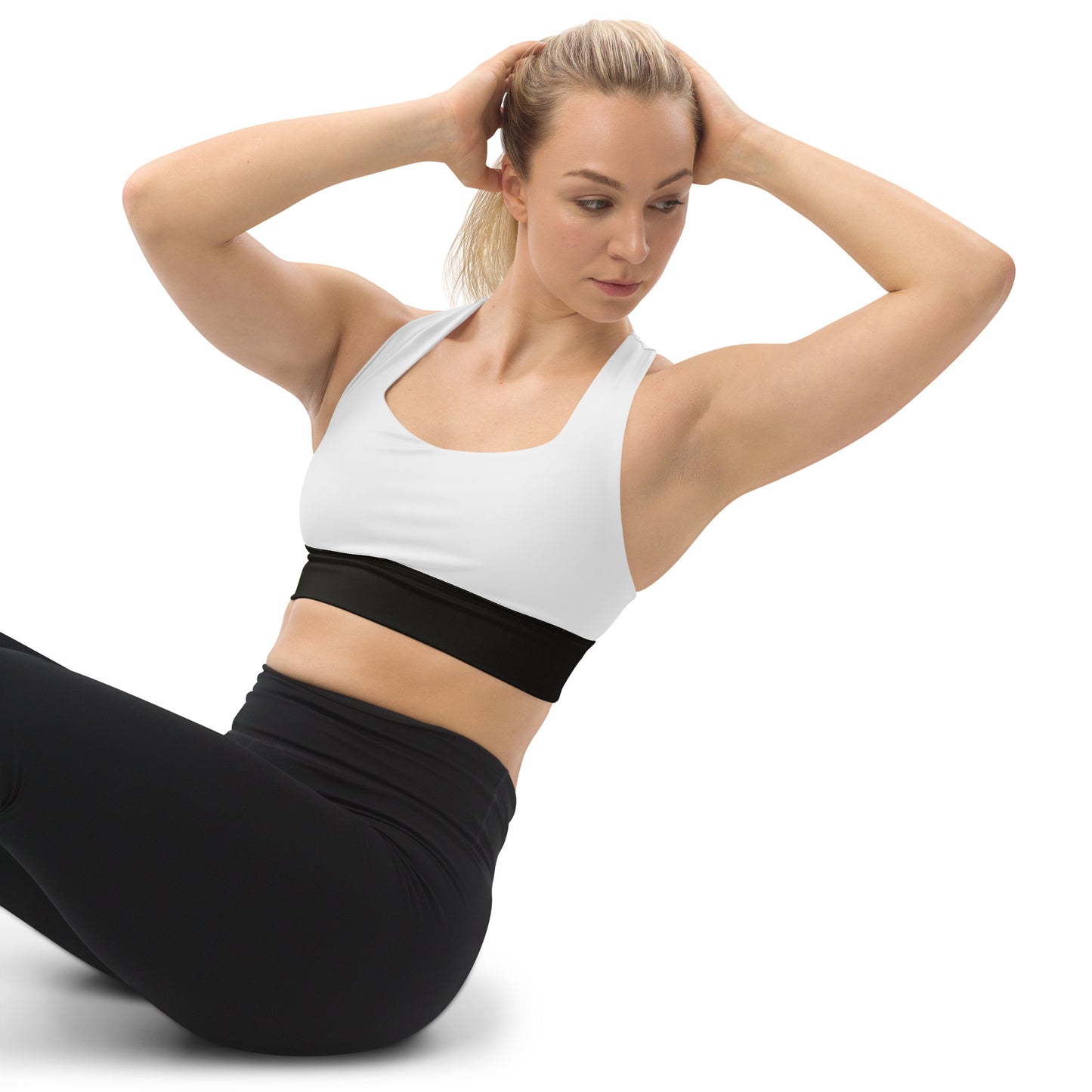 White and black sports bra performance activewear. Compression fabric with sports mesh lining.