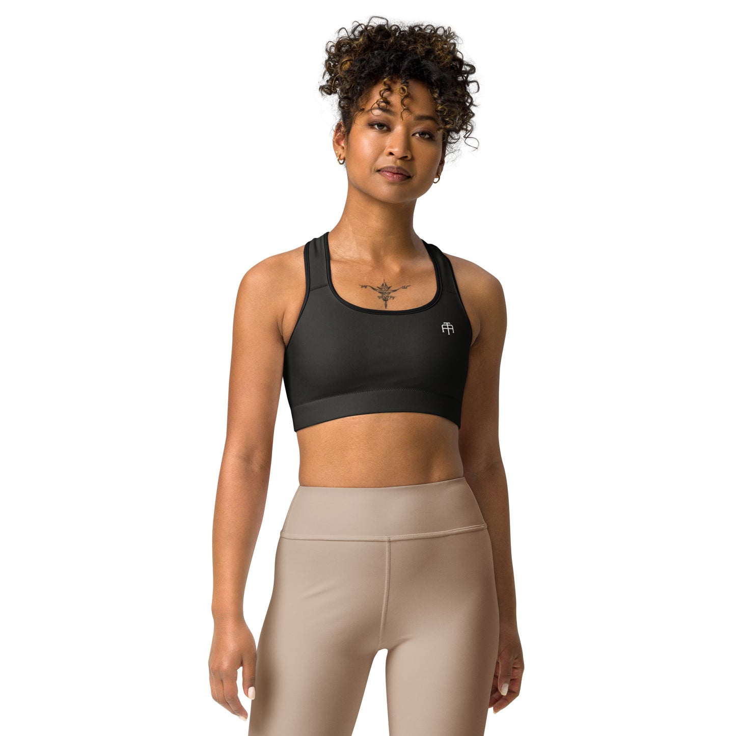 Black and white four-way stretch moisture-wicking sports bra by An Athlete Trains