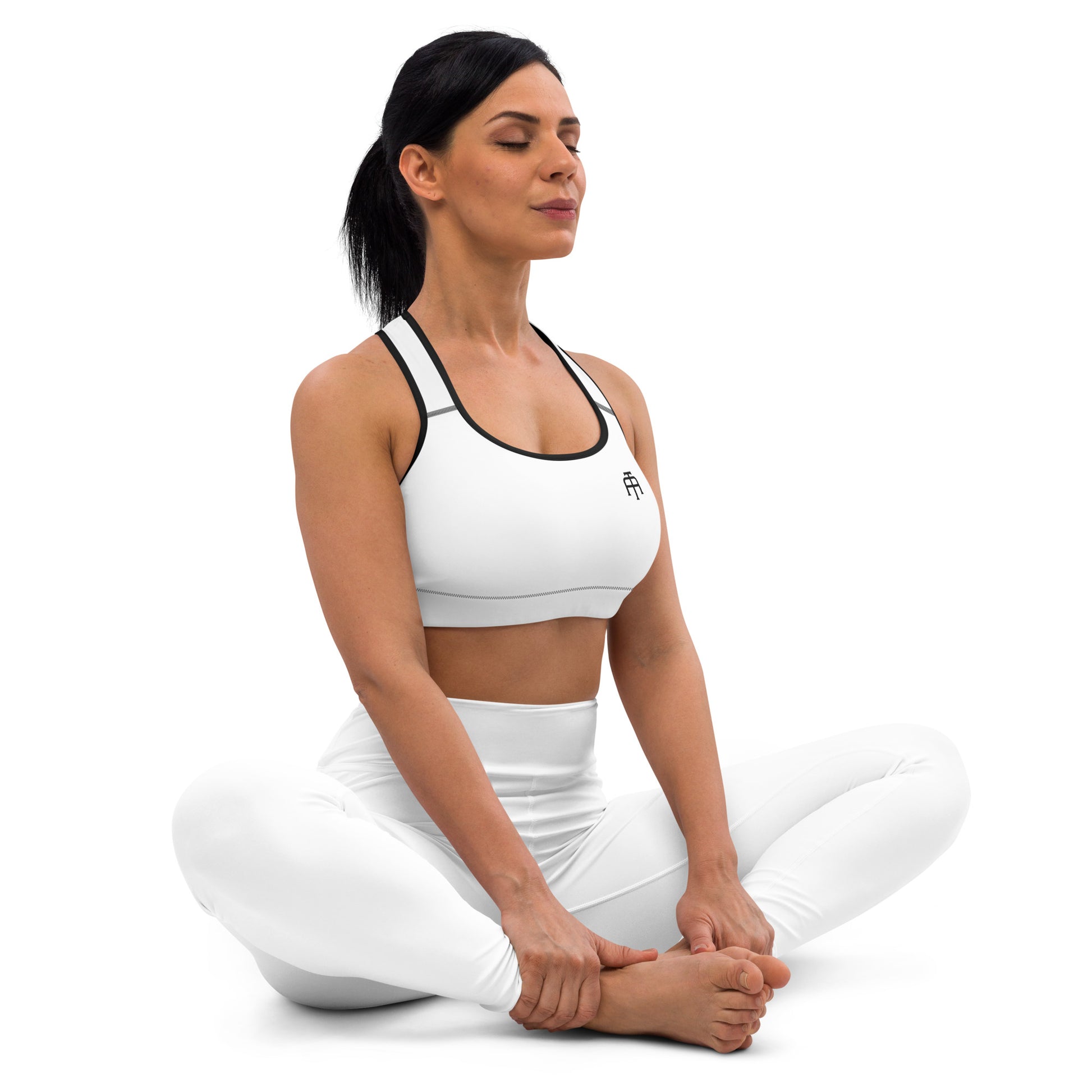 White four-way stretch moisture-wicking sports bra by An Athlete Trains