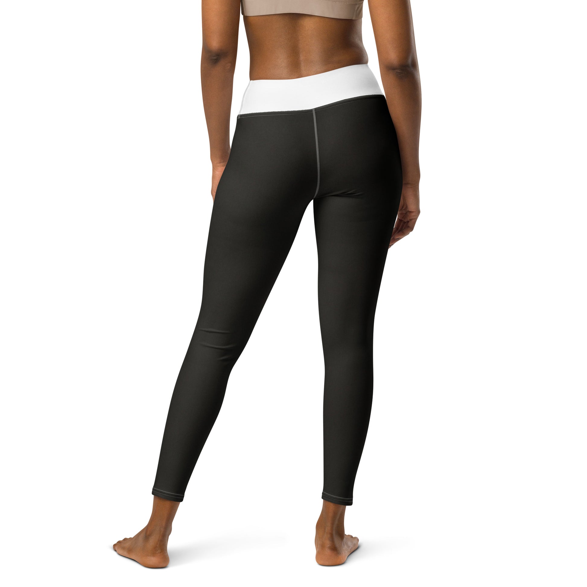 Black yoga pants by An Athlete Trains. White yoga leggings