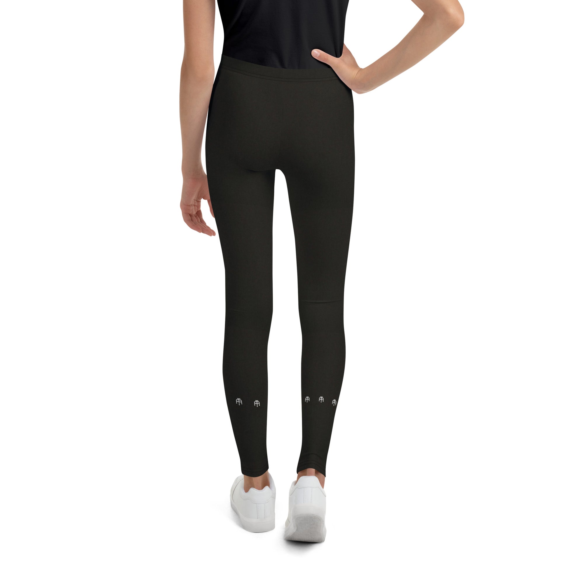 Black soft microfiber youth leggings with an elastic waistband by An Athlete Trains