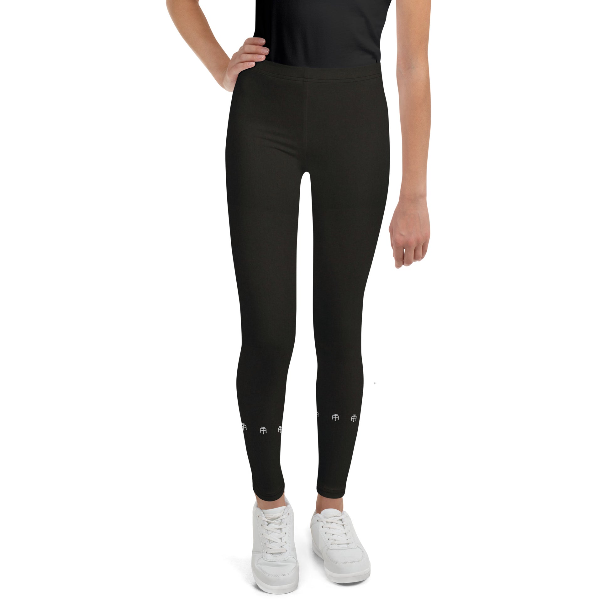 Black soft microfiber youth leggings with an elastic waistband by An Athlete Trains