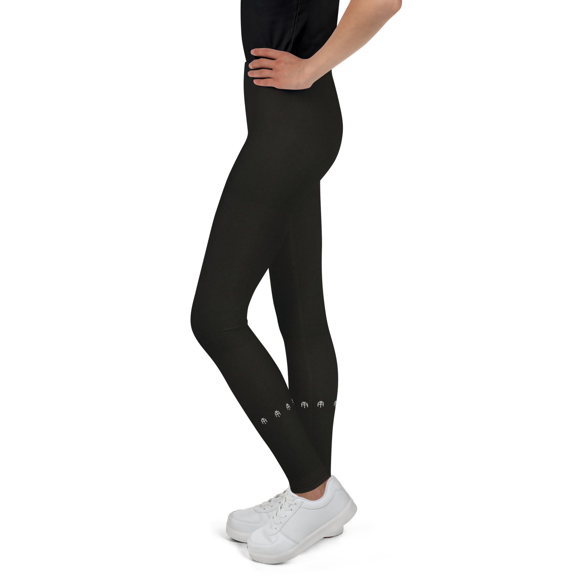 Black soft microfiber youth leggings with an elastic waistband by An Athlete Trains