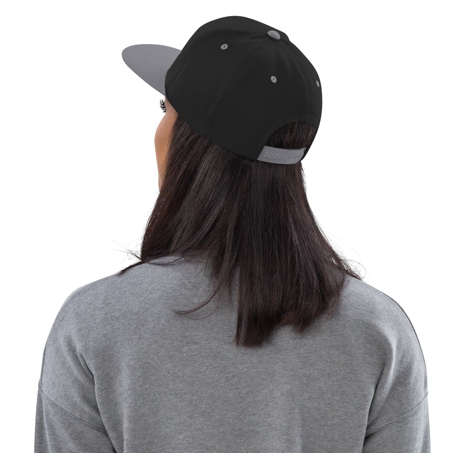 An Athlete Trains structured hat with a classic fit, flat brim, full buckram, and adjustable snap closure.