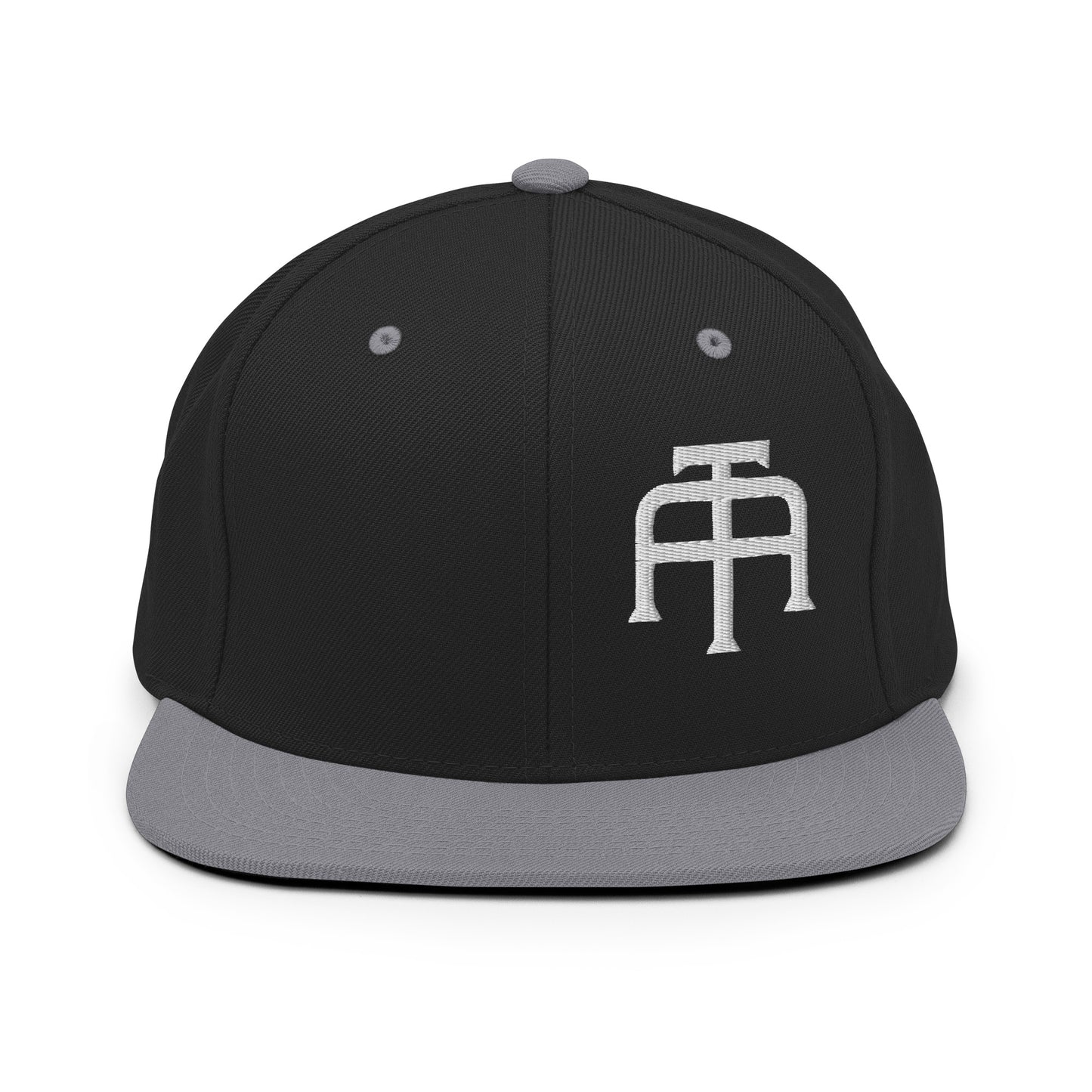 An Athlete Trains structured hat with a classic fit, flat brim, full buckram, and adjustable snap closure.