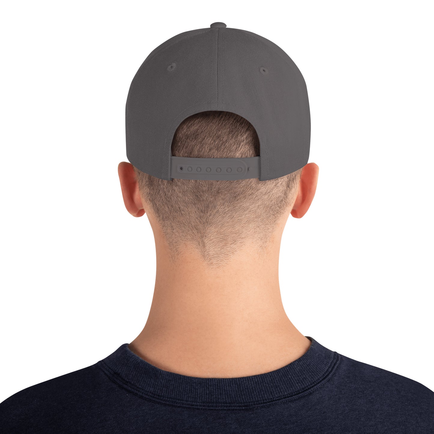 An Athlete Trains structured hat with a classic fit, flat brim, full buckram, and adjustable snap closure.