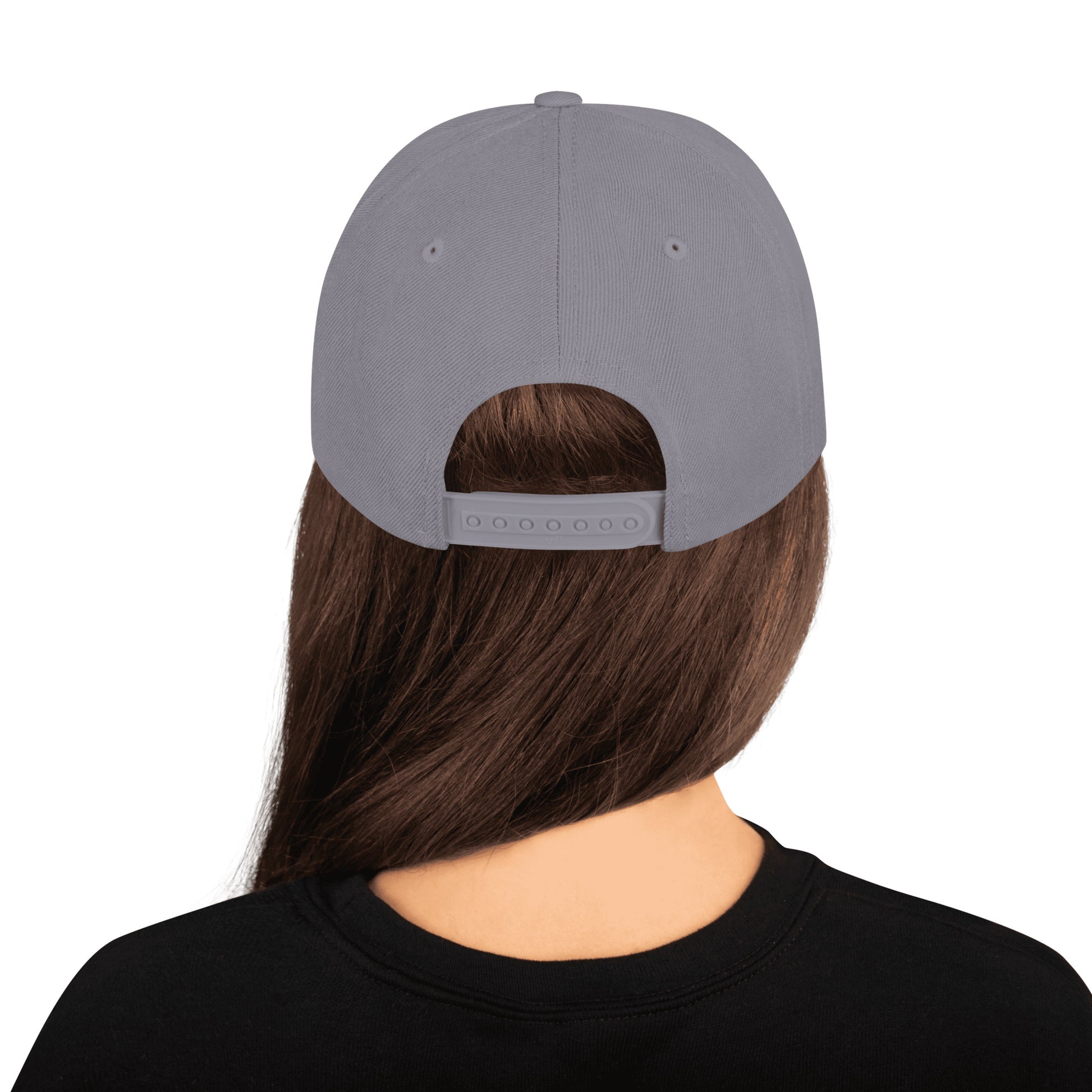 An Athlete Trains structured hat with a classic fit, flat brim, full buckram, and adjustable snap closure.