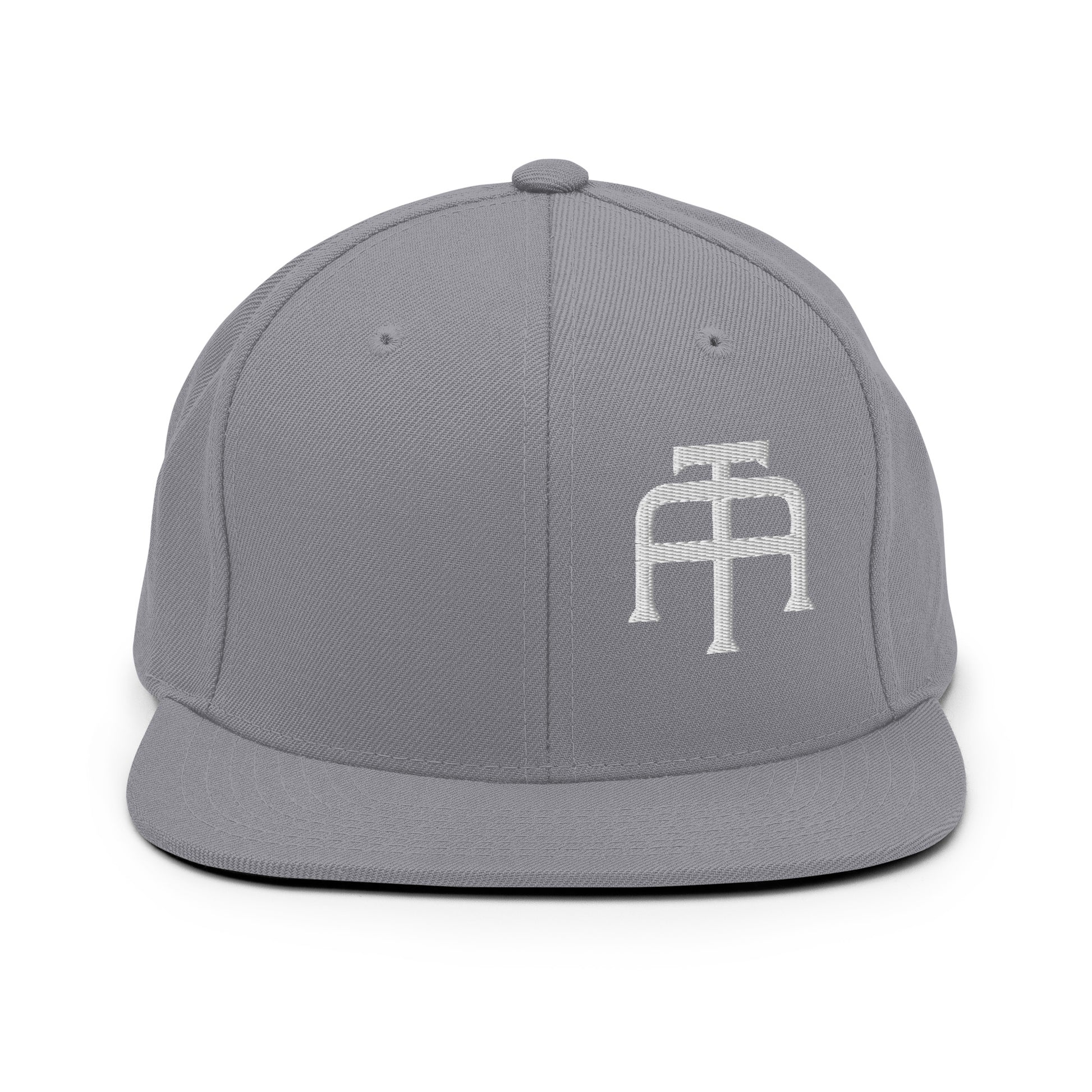 An Athlete Trains structured hat with a classic fit, flat brim, full buckram, and adjustable snap closure.