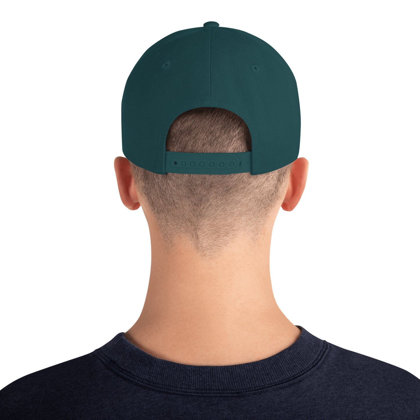 An Athlete Trains structured hat with a classic fit, flat brim, full buckram, and adjustable snap closure.