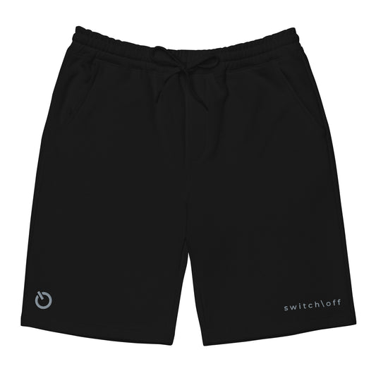 Men's relaxed fleece shorts with jersey-lined pockets in black with gray switch\off embroidery - An Athlete Trains.