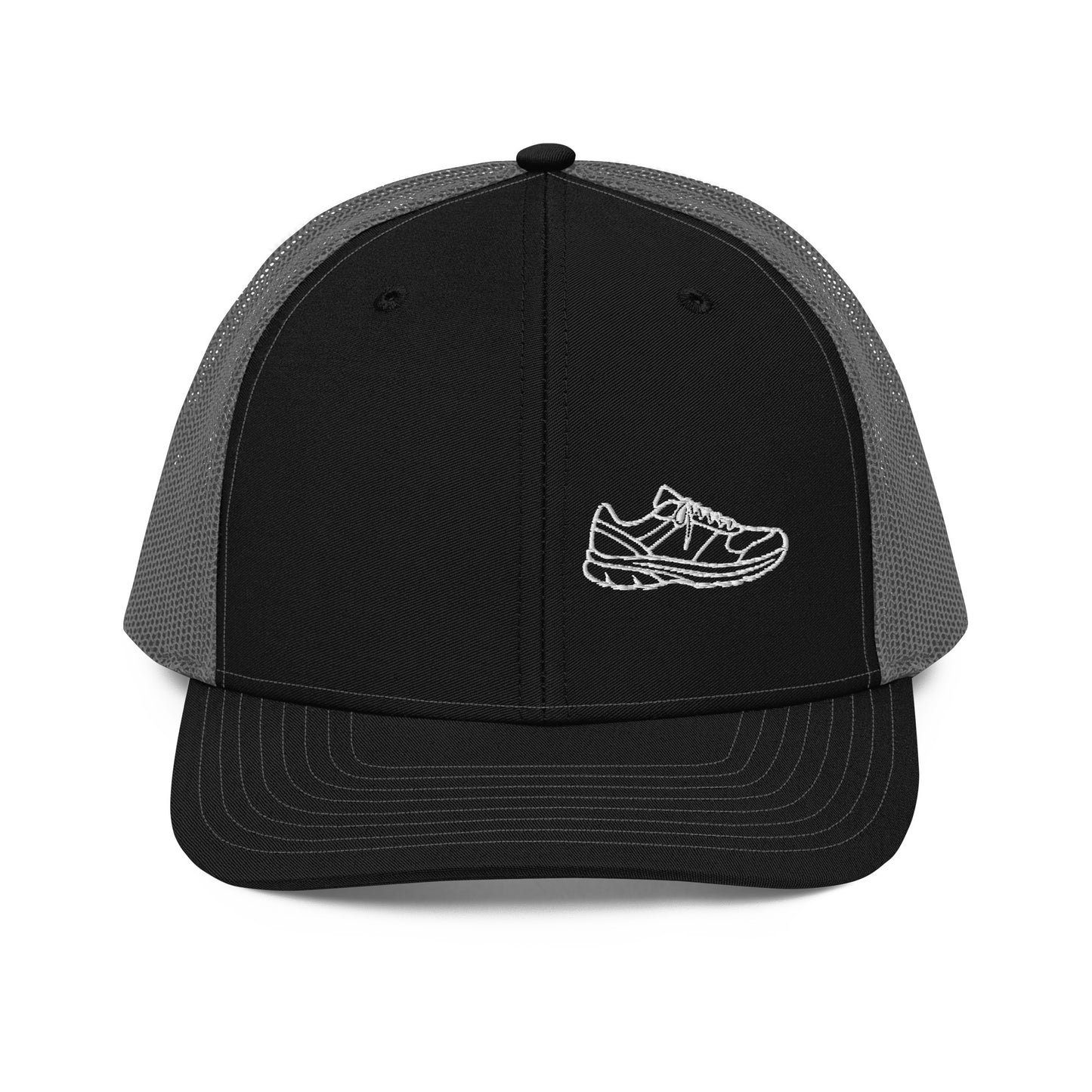 Running Edition trucker cap in black and charcoal with structured front and breathable mesh back — Our Game collection by An Athlete Trains