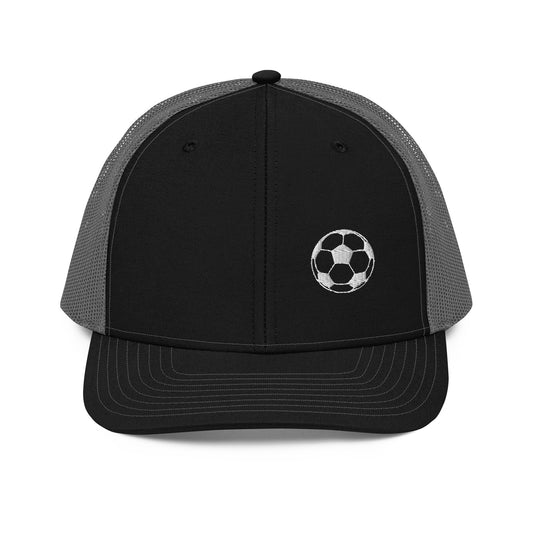Soccer Edition trucker cap in black and charcoal with structured front and breathable mesh back | Our Game | An Athlete Trains