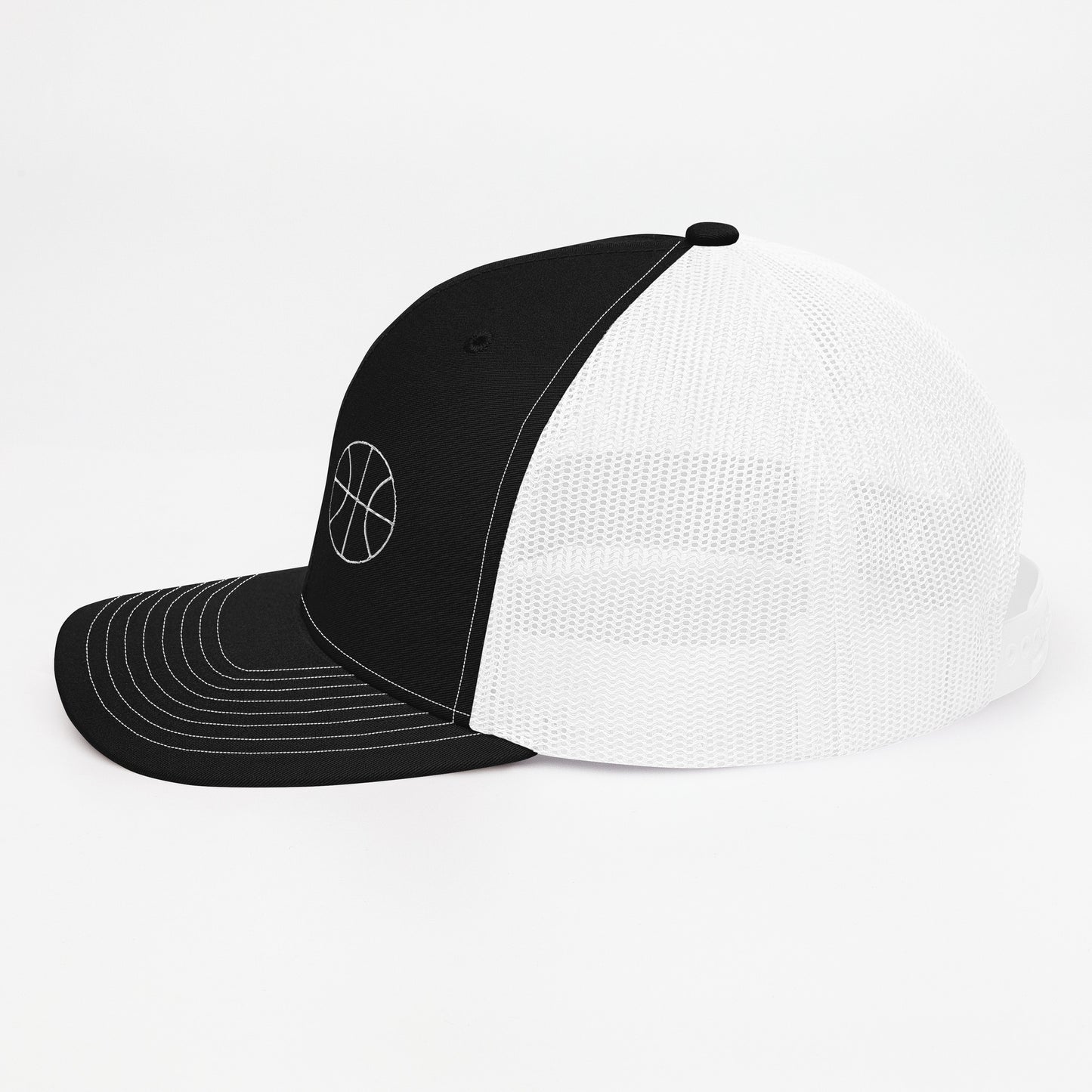 Basketball Edition trucker cap in black and white with structured front and breathable mesh back — Our Game collection by An Athlete Trains