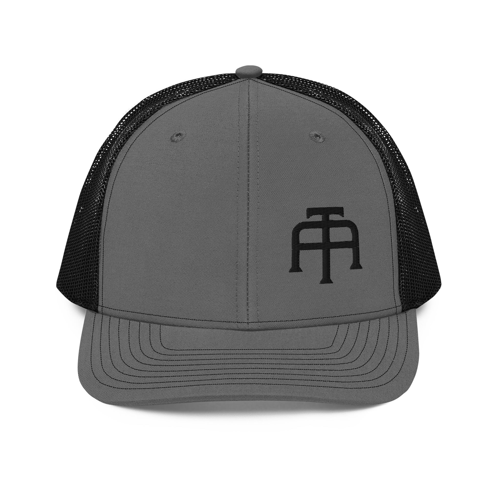 An Athlete Trains structured 6-panel, mid-profile trucker cap is 60% cotton, 40% polyester, 100% polyester mesh back. Pre-curved contrast stitched visor, underbill matches visor color and adjustable plastic snapback