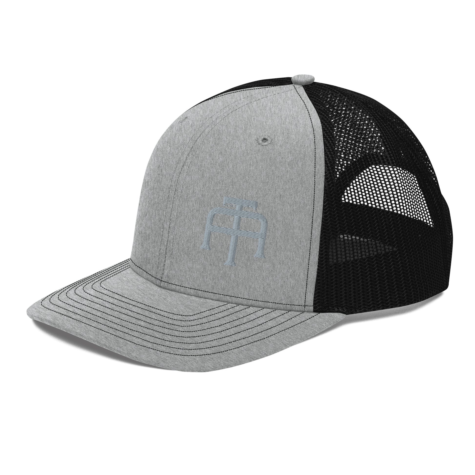 An Athlete Trains structured 6-panel, mid-profile trucker cap is 60% cotton, 40% polyester, 100% polyester mesh back. Pre-curved contrast stitched visor, underbill matches visor color and adjustable plastic snapback