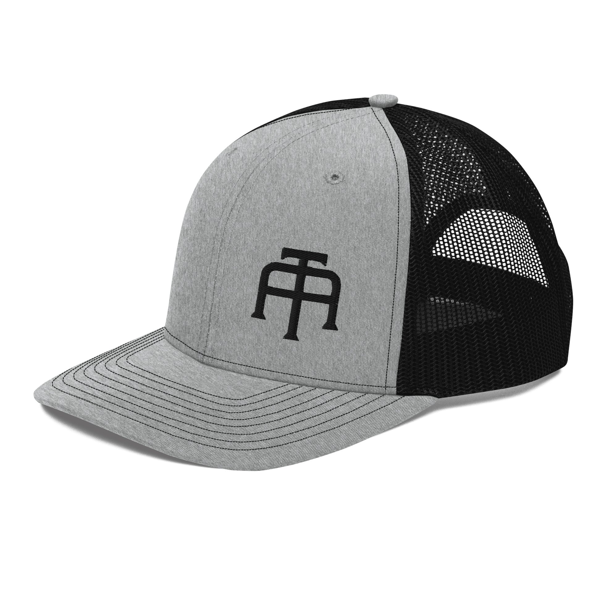 An Athlete Trains structured 6-panel, mid-profile trucker cap is 60% cotton, 40% polyester, 100% polyester mesh back. Pre-curved contrast stitched visor, underbill matches visor color and adjustable plastic snapback