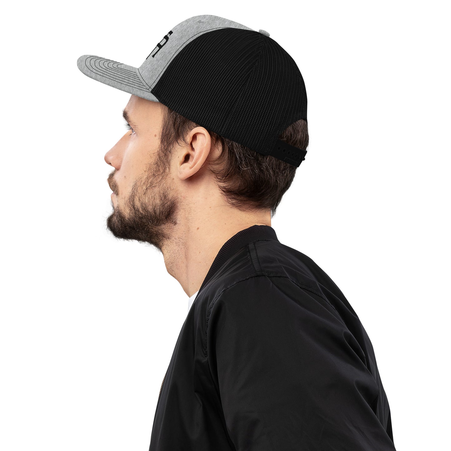 An Athlete Trains structured 6-panel, mid-profile trucker cap is 60% cotton, 40% polyester, 100% polyester mesh back. Pre-curved contrast stitched visor, underbill matches visor color and adjustable plastic snapback