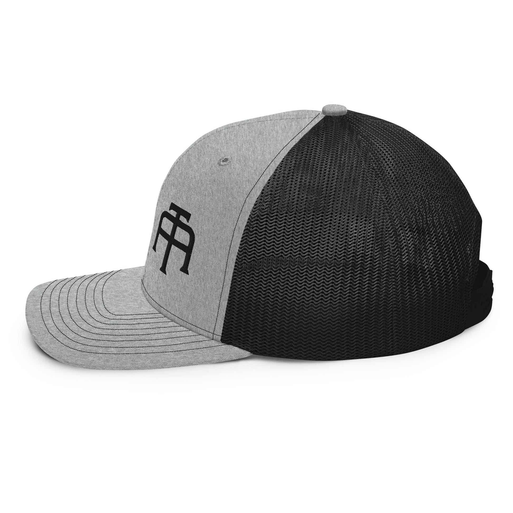 An Athlete Trains structured 6-panel, mid-profile trucker cap is 60% cotton, 40% polyester, 100% polyester mesh back. Pre-curved contrast stitched visor, underbill matches visor color and adjustable plastic snapback