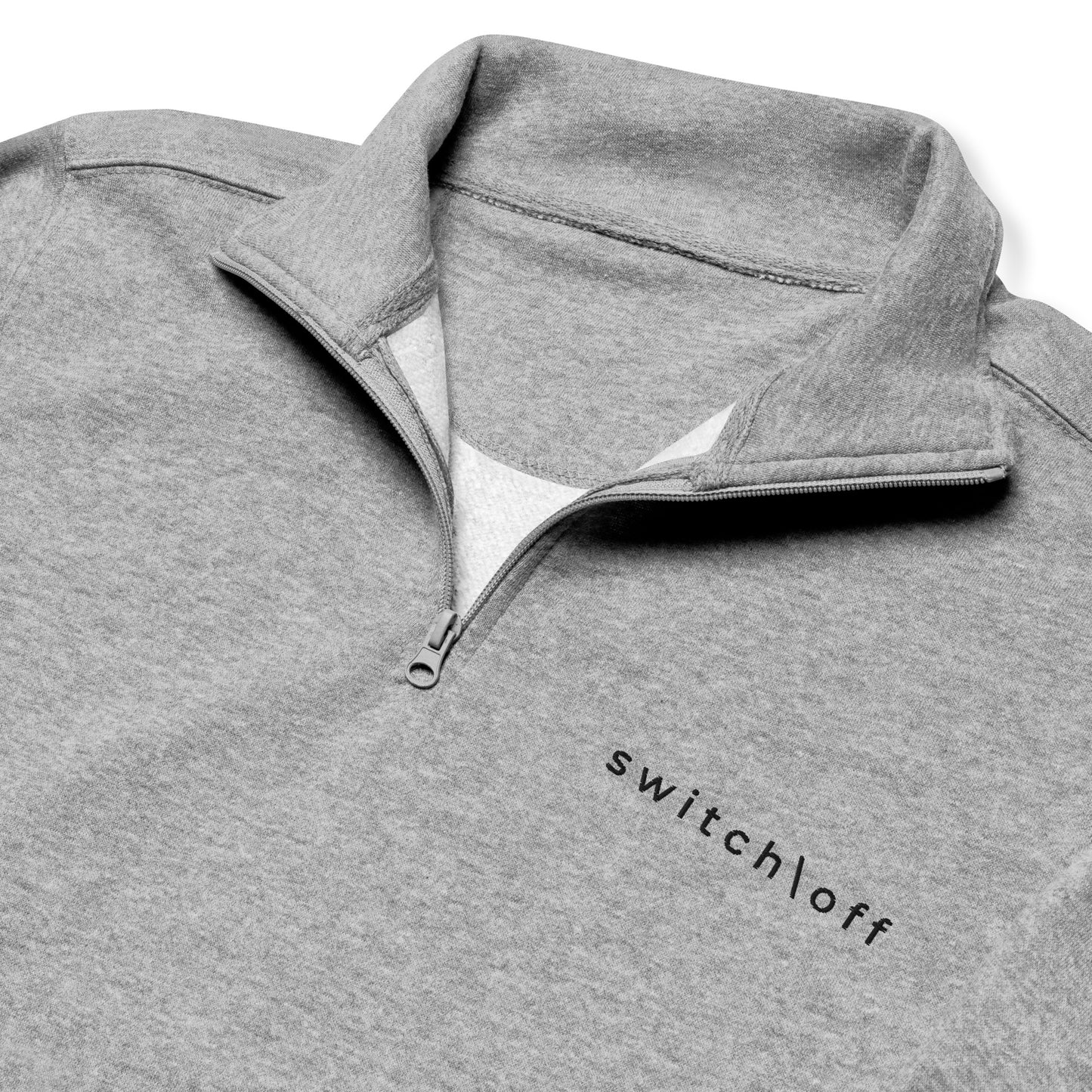 Soft fleece pullover in carbon gray with black switch\off and logo embroidery- An Athlete Trains.