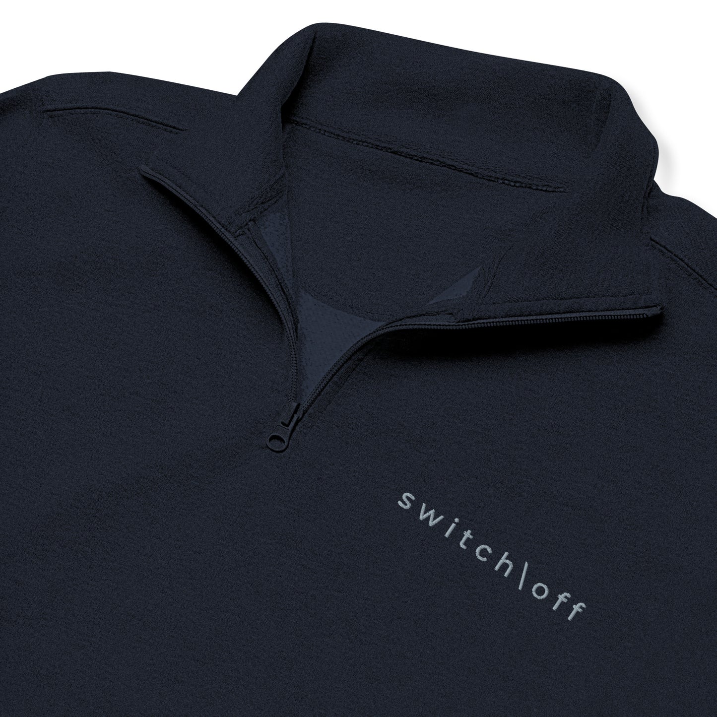 Soft fleece pullover in navy with gray switch\off and logo embroidery- An Athlete Trains.