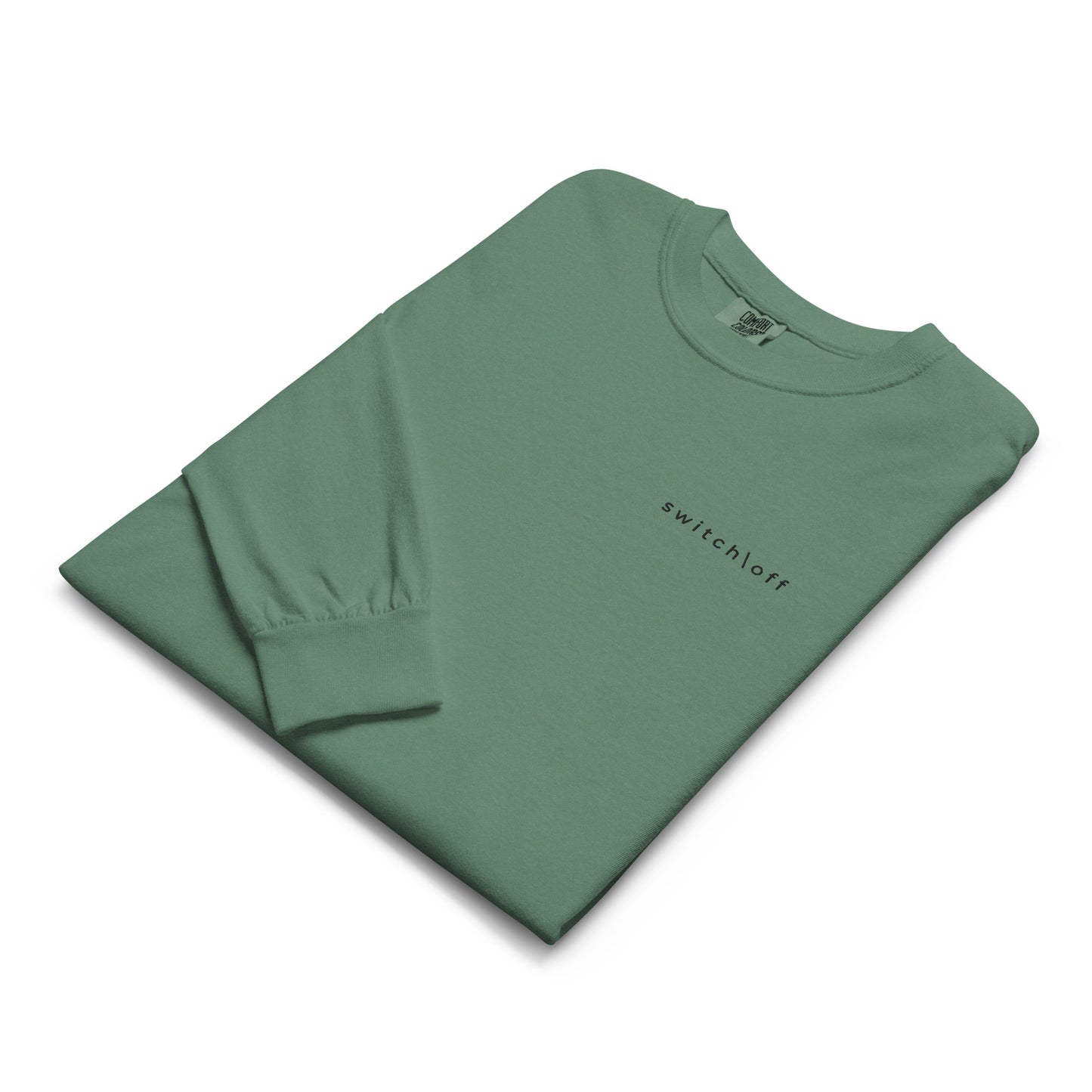 Premium heavyweight long sleeve cotton shirt in light green with black switch\off embroidery - An Athlete Trains. Front view