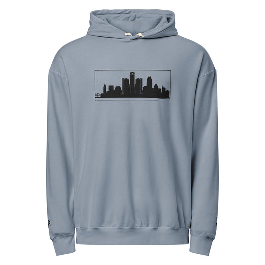 Blue Jean color Detroit Edition garment-dyed lightweight hoodie with embroidered Detroit skyline and DET wrist detail | Out City | An Athlete Trains