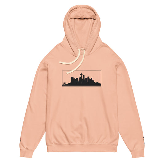 Peachy color Seattle Edition lightweight garment-dyed hoodie featuring Seattle skyline, Space Needle, and SEA wrist embroidery | Our City | An Athlete Trains