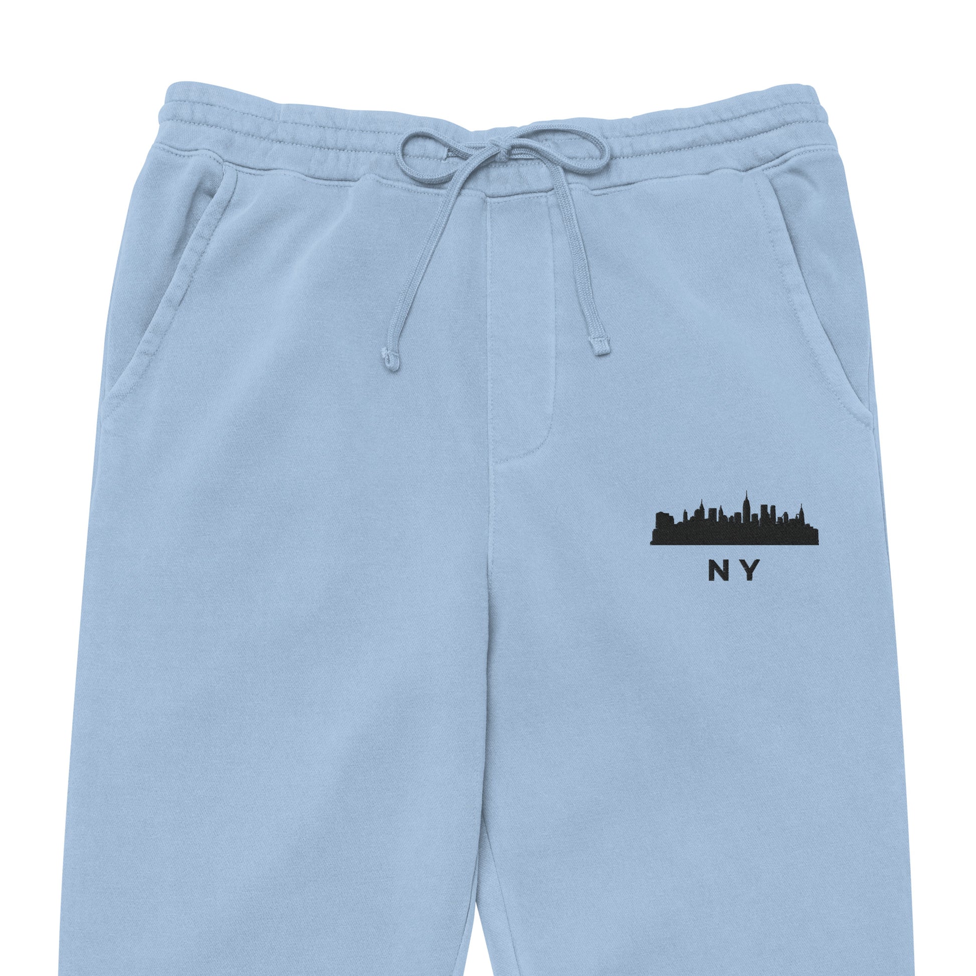 New York Our City pigment-dyed sweatpants in light blue with a relaxed fit and embroidered New York detail—NYC athletic lifestyle wear