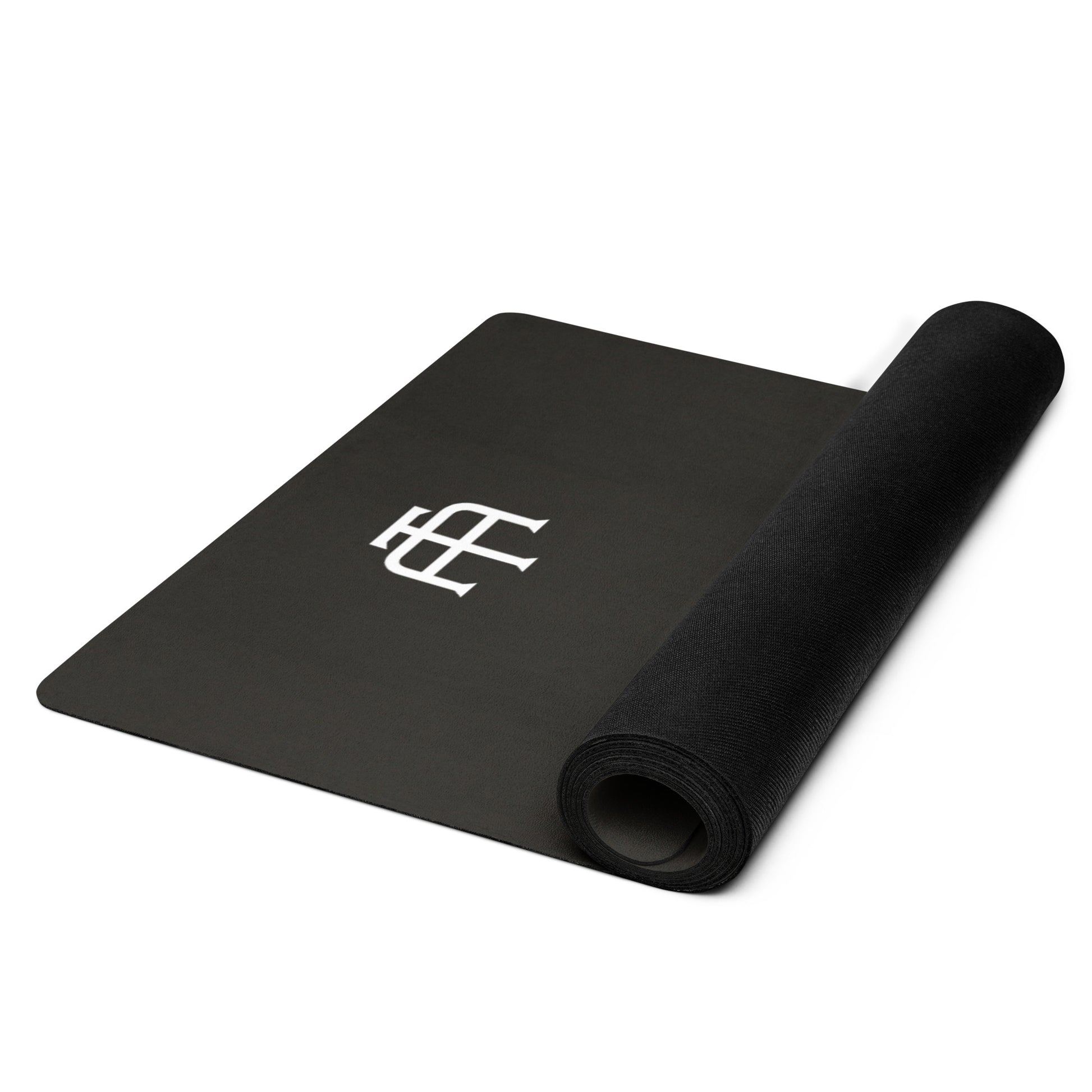 Black rubber yoga mat with a microsuede top by An Athlete Trains