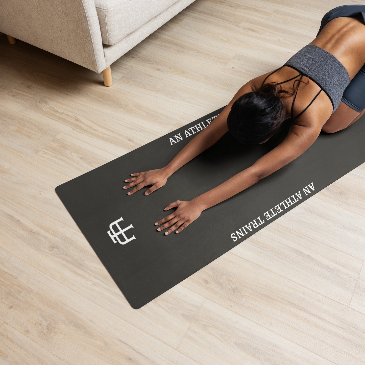 Black rubber yoga mat with a microsuede top by An Athlete Trains